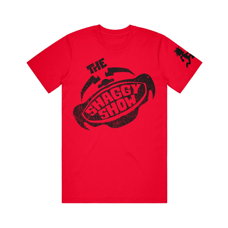 image of a red tee shirt on a white background. tee has center print in black that says the shaggy show. black logo of the hatchetman on right sleeve