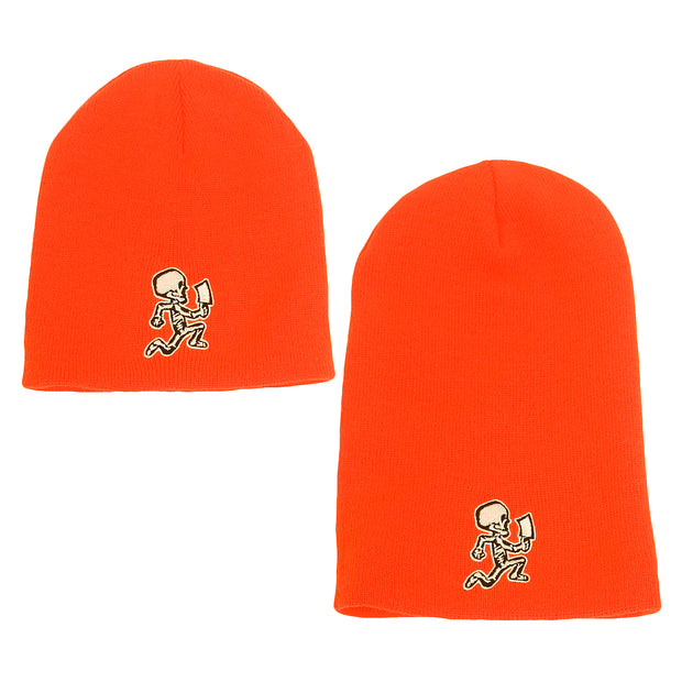 image of a small and a large orange winter beanie on a white background. small is on the left and large is on the right. both have white and black embroidery across the bottom of a skeleton hatchetman