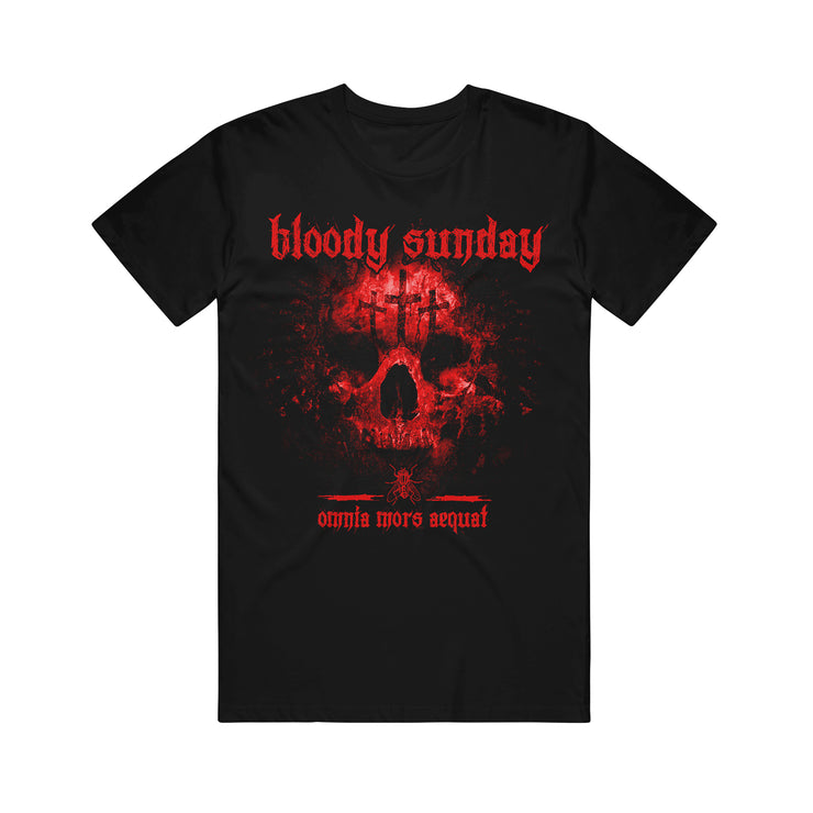 image of the front of a black tee shirt on a white background. front of tee has red print that  says bloody sunday. there is a red skull with three crosses on the forehead.