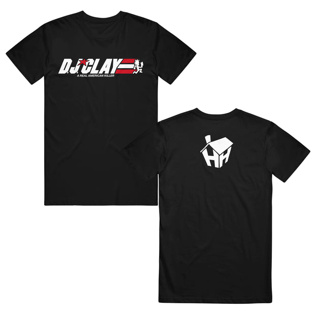 image of the front and back of a black tee shirt on a white background. front says D J Clay across the chest and A Real American Killer below it. the back has an image of a house on the top center