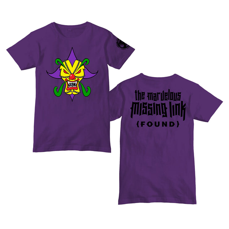 image of the front and back of a purple tee shirt on a white background. the front on the left has a center print of a evil clown face. the back has top center print in black that says the marvelous missing link (FOUND)